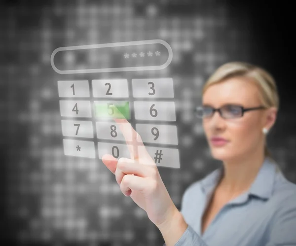 Businesswoman dialing number Royalty Free Stock Images