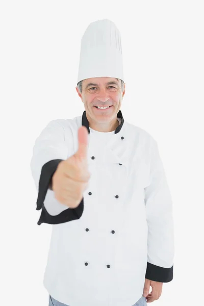 Mature chef gesturing thumbs up Stock Image