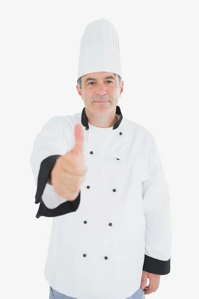 Mature chef showing thumbs up sign Royalty Free Stock Images