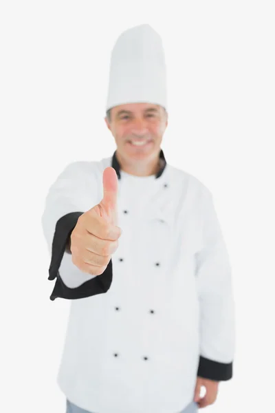 Happy mature chef showing thumbs up Stock Picture