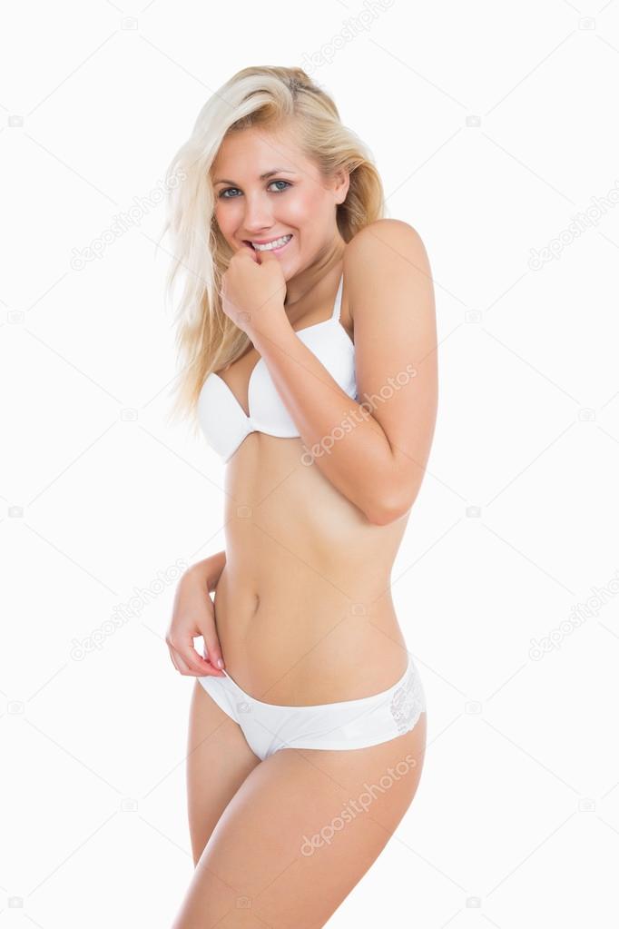 Happy woman in white underwear Stock Photo by ©Wavebreakmedia 24094819