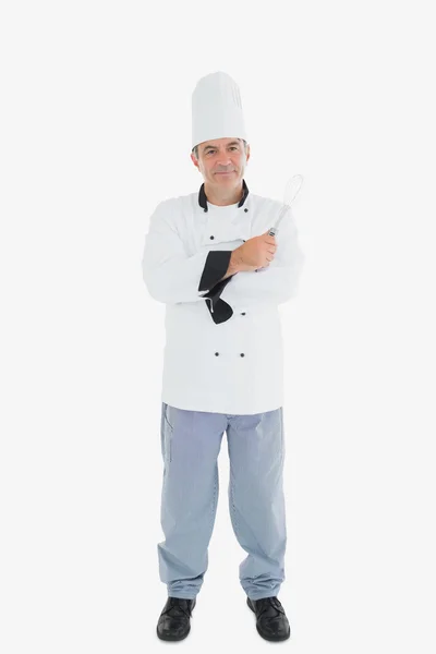 Male chef holding wire whisk — Stock Photo, Image