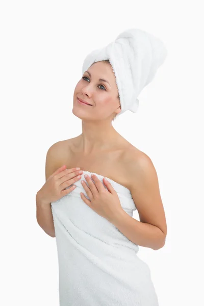 Happy young woman wrapped in towel — Stock Photo, Image