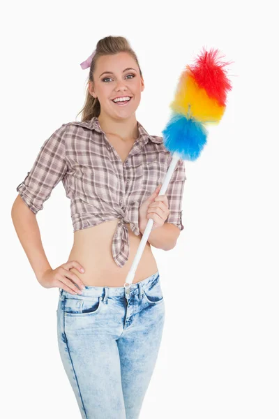 Portrait of casual woman with colorful feather duster — Stock Photo, Image