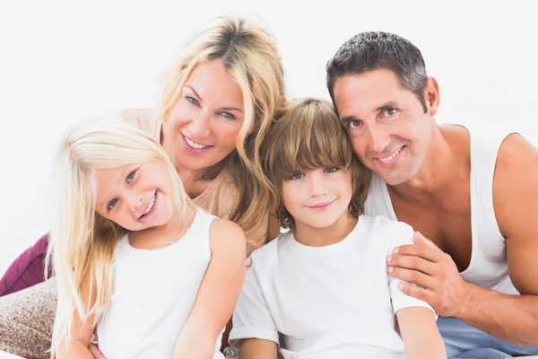 Cute family using the laptop together — Stock Photo, Image