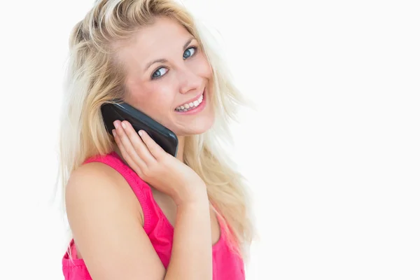 Portrait of happy casual young woman on call — Stock Photo, Image
