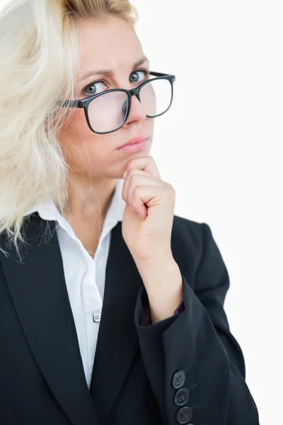 Portrait of thoughtful business woman with hand on chin — Stock Photo, Image