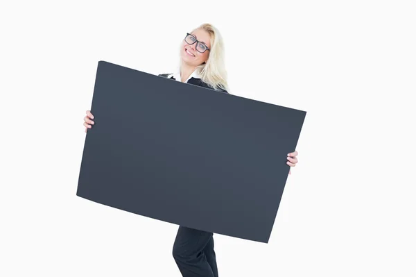 Young business woman holding a blank board — Stock Photo, Image