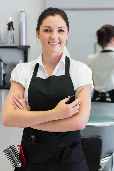 Donfident female hairdresser with hair scissors — Stock Photo, Image