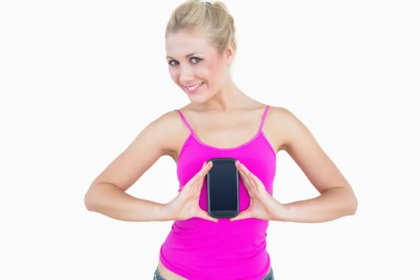 Portrait of casual young woman with new smartphone — Stock Photo, Image