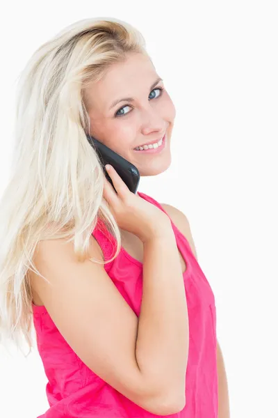 Portrait of happy casual young woman on call — Stock Photo, Image