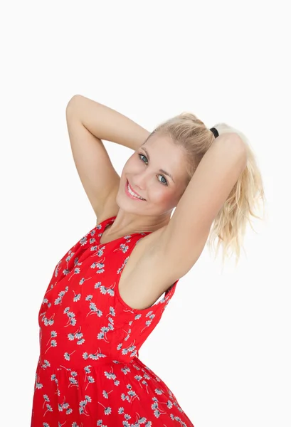 Portrait of young woman in red summer dress — Stock Photo, Image