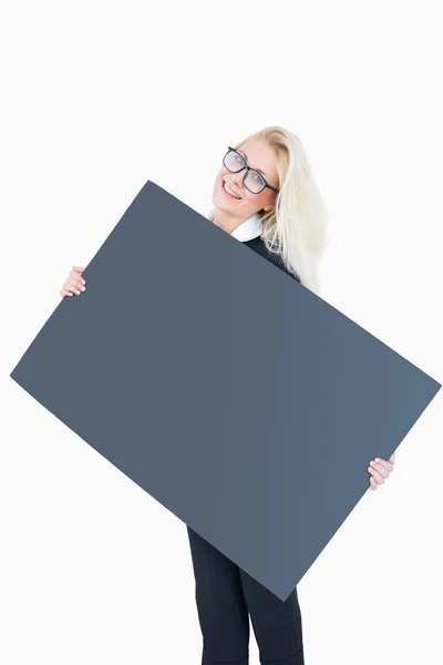 Portrait of happy business woman holding blank board — Stock Photo, Image