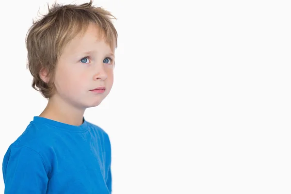 Cute young boy looking away Royalty Free Stock Photos