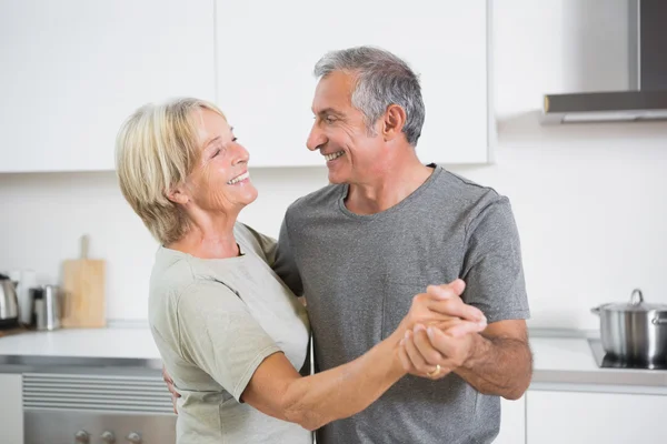 Happy couple dancing together — Stock Photo, Image