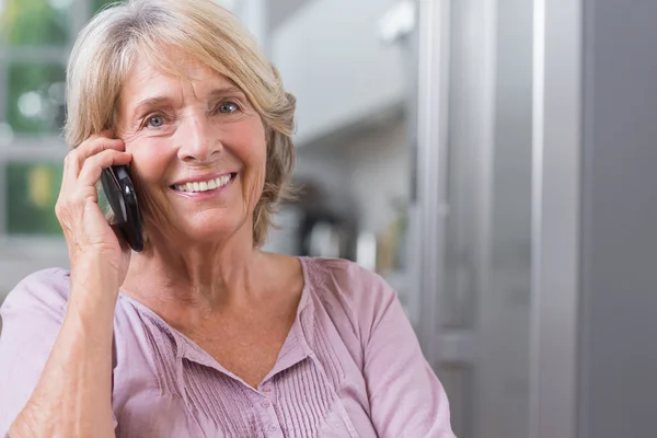 Happy mature woman calling — Stock Photo, Image