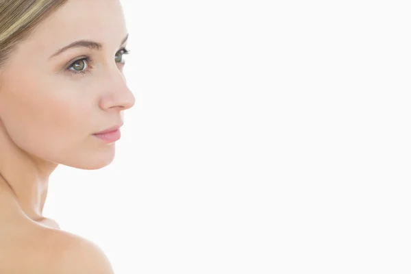 Close-up of attractive young woman looking away — Stock Photo, Image