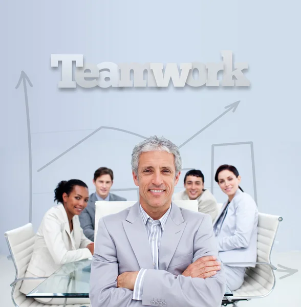 Businessman smiling in a meeting — Stock Photo, Image