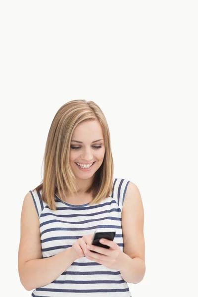 Casual young woman with smartphone — Stock Photo, Image