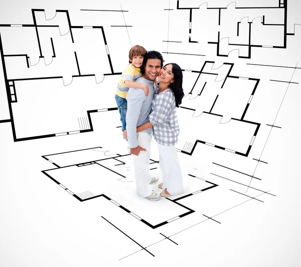 Smiling family against an architectural plan background — Stock Photo, Image
