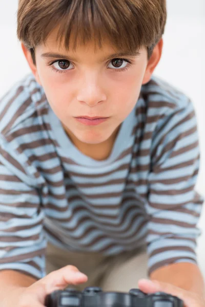 Little boy playing games console — Stock Photo, Image