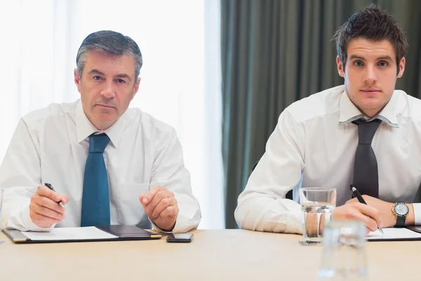 Businessmen looking up — Stock Photo, Image