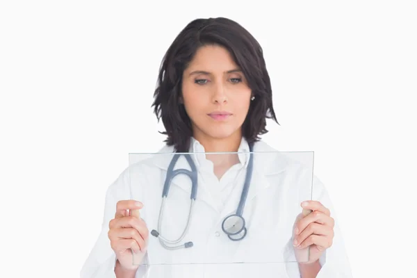 Doctor holding virtual screen — Stock Photo, Image