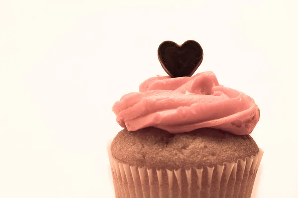 Alla hjärtans cupcake med rosa glasyr — Stockfoto