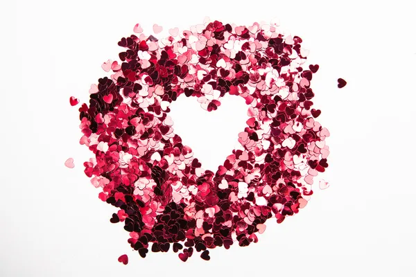 Confetti rosa a forma di cuore rovesciato — Foto Stock