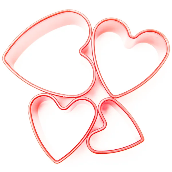 Four heart cookie cutters — Stock Photo, Image