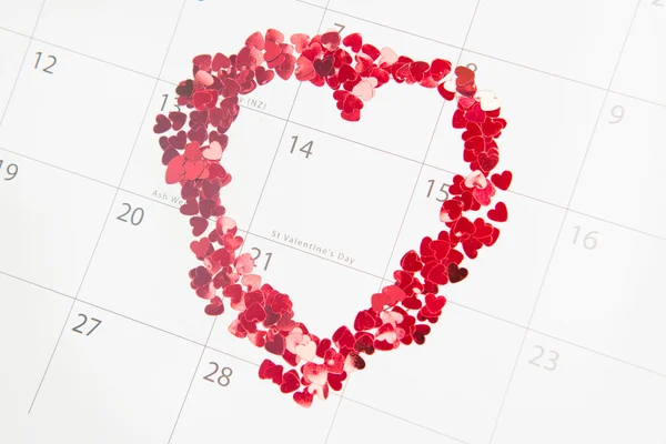 Confetti heart shape marking valentines day — Stock Photo, Image