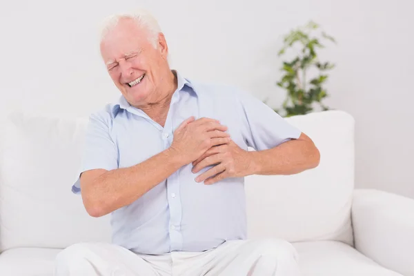 Old man suffering with heart pain — Stock Photo, Image