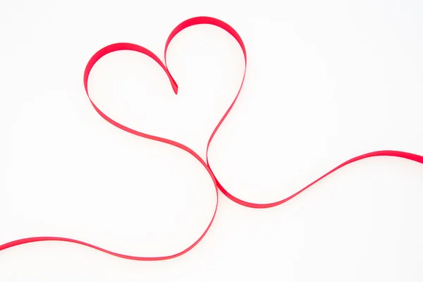 Heart shaped pink ribbon — Stock Photo, Image