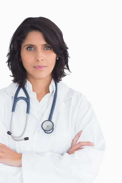Doctor with a stethoscope and arms crossed — Stock Photo, Image