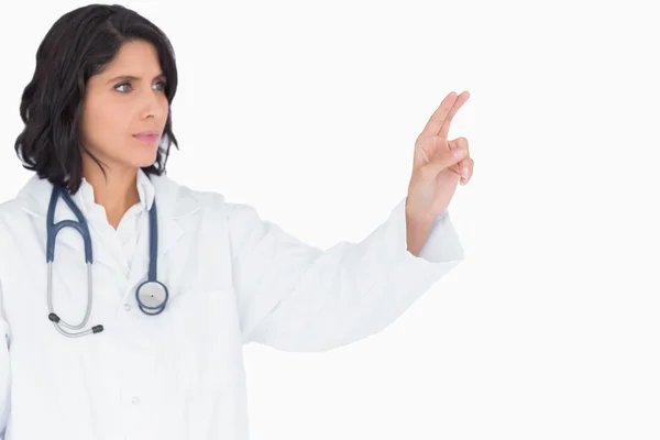 Doctor pointing to something — Stock Photo, Image
