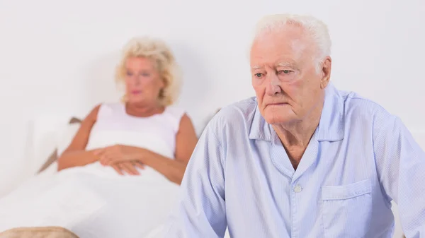 Unsmiling aged couple — Stock Photo, Image