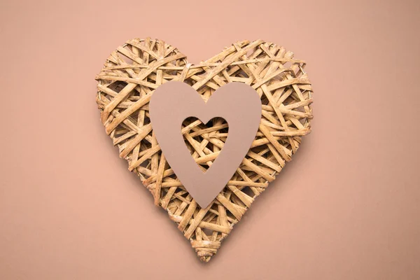 Wicker heart ornament with paper cut out — Stock Photo, Image