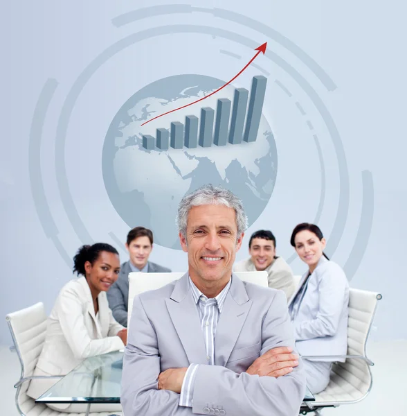 Mature businessman smiling in a meeting Stock Photo