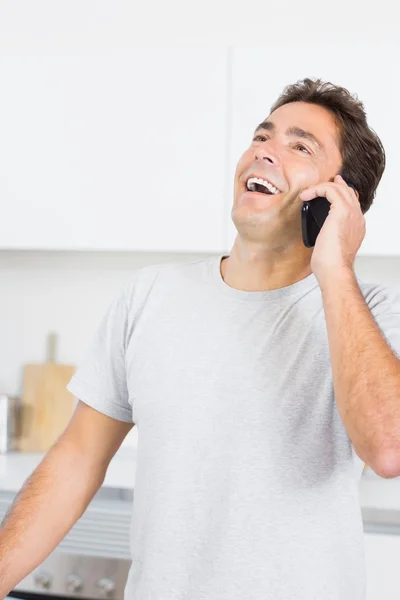 Laughing man on the phone Royalty Free Stock Images