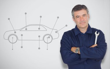 Mature mechanic standing next to car diagram clipart