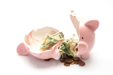 Piggy bank broken with money inside clipart