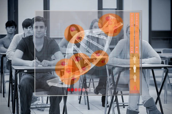 Classmates concentrated on futuristic interface with DNA — Stock Photo, Image