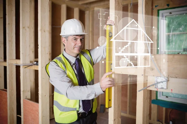 Architect using spirit level and looking at white hologram inter — Stock Photo, Image