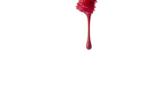 Spilled red nail polish — Stock Photo, Image