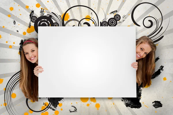 Pretty girls holding blank advertis — Stock Photo, Image