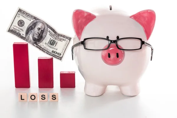 Piggy bank wearing glasses with loss message — Stock Photo, Image