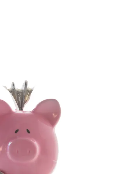 Dollar peeking out of piggy bank — Stock Photo, Image