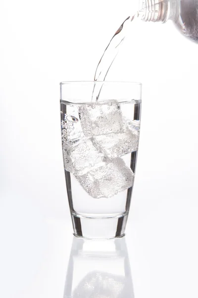 Sparkling water filling glass — Stock Photo, Image