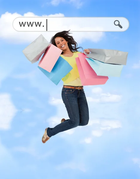 Boldog lány ugrás az ő bevásárló táskák cím büfé — Stock Fotó