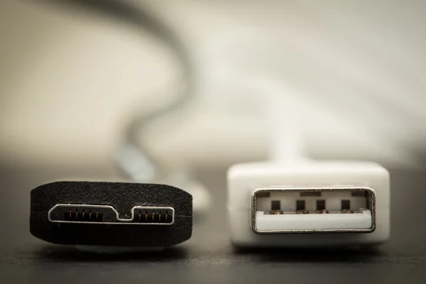 Close up of tip of black USB SS and white USB — Stock Photo, Image